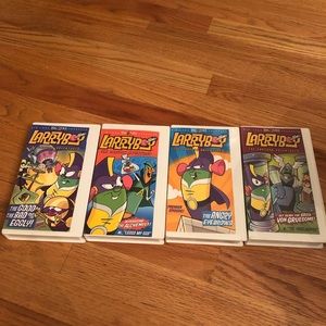 Lot of 4 vintage Veggie Tales Larry Boy VHS tapes with hardcover